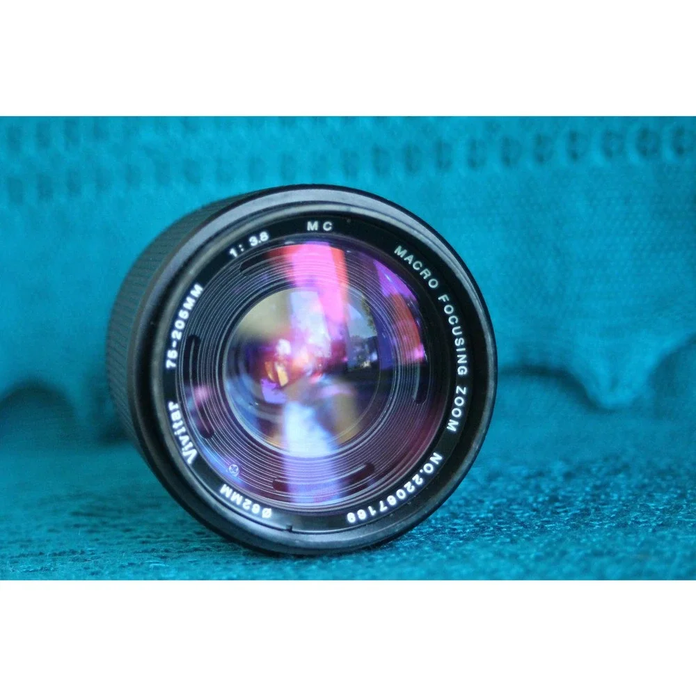 Vivitar 75-205 MM F1:3.8 Lens for Minolta MC mount with 2x converter.